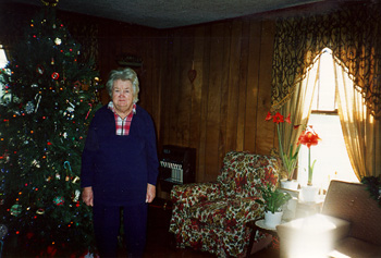 Mother by Christmas tree